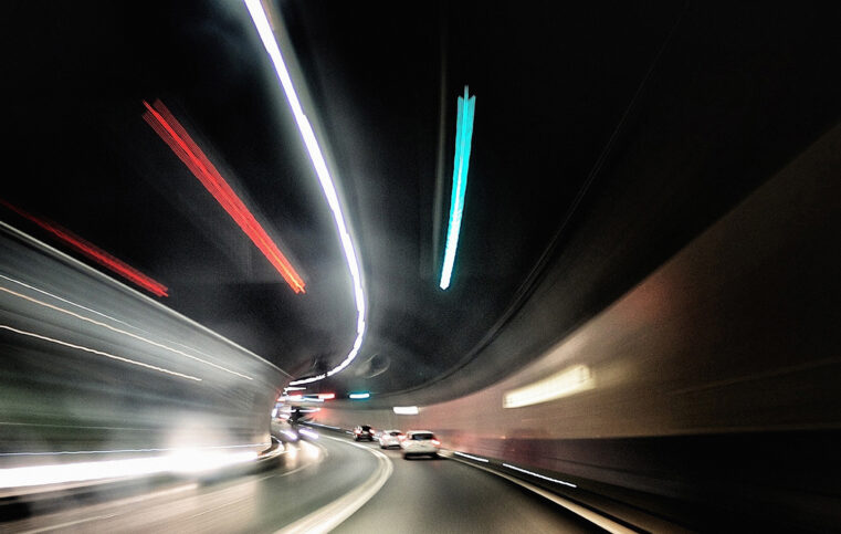 Blurred motion of road tunnel at night